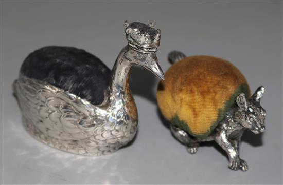 A Hanau novelty silver pin cushion modelled as a crowned swan and a squirrel pin cushion impressed silver, swan height 2.25in.